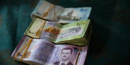 مصرف سوريا المركزي يرفع قيمة الليرة ويخفض سعر صرف الدولار إلى 11 ألفًا