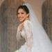 الفنانة رنا رئيس تتألق بفستان زفاف استثنائي في ليلة العمر بحضور نجوم الفن